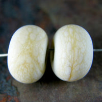 Etched light ivory handmade lampwork glass beads