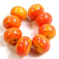 Shiny apricot orange handmade lampwork glass beads