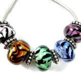 Example group of zebra and tiger stripe large hole lampwork beads in different colors