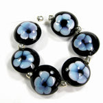 Handmade Lampwork Glass Lentil Bead Set, Black Blue Flowers Shiny