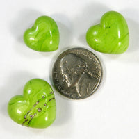 Example showing different sizes of handmade lampwork heart beads