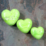Example showing different sizes of handmade lampwork heart beads